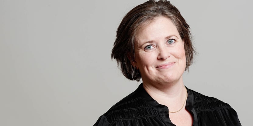 Portrettbilde av en smilende Hanne Rygg