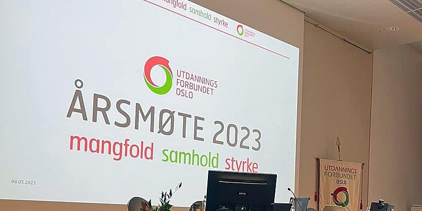 Bilde av hovedskjerm med årsmøtelogo ÅM 2023 - UDF Oslo